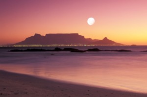 Moon over Table Mountain in Cape Town from Bloubergstrand